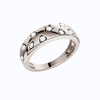 A white gold band ring featuring rows of stars and other shapes, each set with a small white round lab grown diamond, shown on a plain white background.