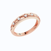 Amorati Diamonds Geometric Studded Diamond Stackable Ring in 14K rose gold. The side view of this eternity ring features a star, diamond and other shapes stamped into the gold and inset with round-cut lab grown diamonds, shown on a clean white background.