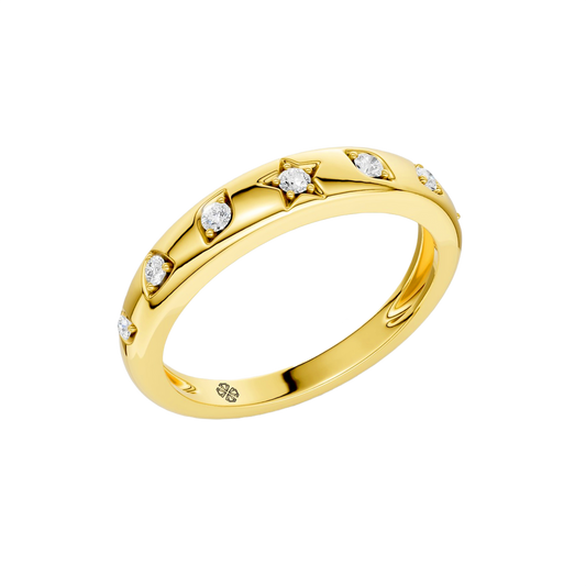A slim 14k yellow gold stackable ring by Amorati featuring delicate star-shaped insets with shimmering round lab-grown diamonds. Amorati’s signature F O U R T E E N T H Collection.