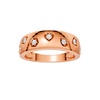 Top view of a bold 14K rose gold statement ring featuring round lab grown diamonds set in mixed geometric and heart shaped bezels