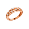 Angled view of the Fourteenth Collection star studded diamond ring in polished rose gold, featuring alternating star-shaped and geometric bezel-set round diamonds across a bold, high-shine band.