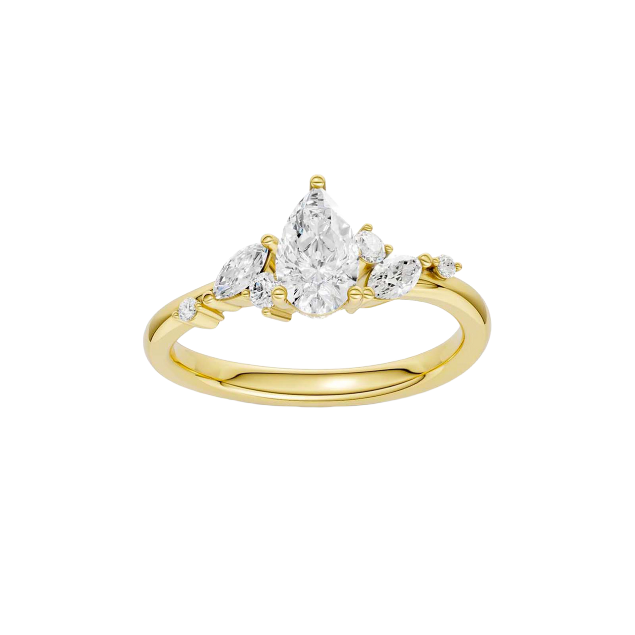 A top-down view of a 14K yellow gold ring with a three-stone cluster of round and pear-shaped gems.