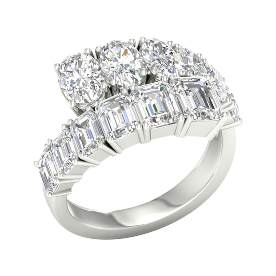An angled view of a 14K white gold ring, showcasing the brilliant, mixed-shape diamond cluster.