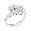 A three-quarter perspective of a 14K white gold bypass ring showcasing a multi-stone cluster of round brilliant diamonds. The staggered diamond rows create a tiered, high-brilliance effect with a pavé-set gold band.