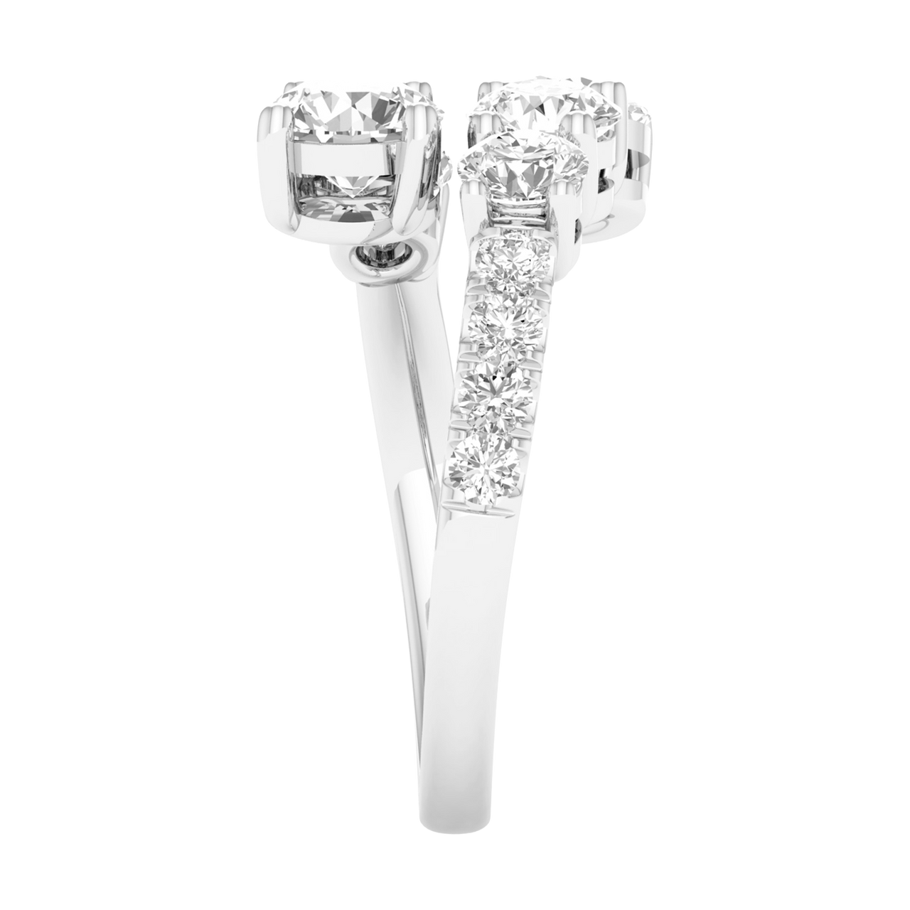 Side view of a white gold bypass ring demonstrating the unique "floating" architecture of the diamond clusters. The image shows the polished interior of the 14K gold shank and the precision pavé detailing along the shoulder.