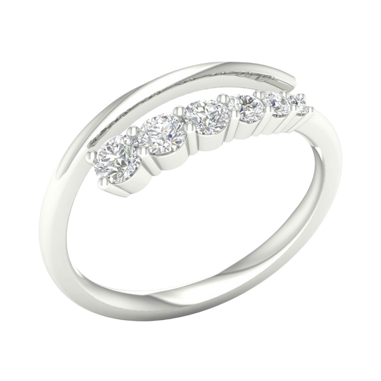 An angled view of a 14K white gold open-shank ring, showcasing the brilliant bezel-set diamonds in a swirling design.