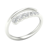 An angled view of a 14K white gold open-shank ring, showcasing the brilliant bezel-set diamonds in a swirling design.