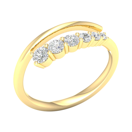 An angled view of a 14K yellow gold open-shank ring, showcasing the brilliant bezel-set diamonds in a swirling design.