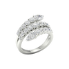 An angled view of a 14K white gold open-shank ring, showcasing the brilliant pavé spiral.