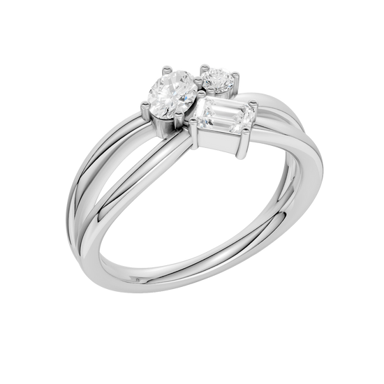 An angled view of a 14K white gold bypass ring, showcasing the baguette cluster and the curved band.