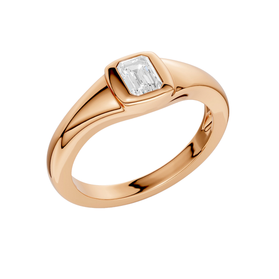 An angled view of Amorati Diamonds Horizon Diamond Ring, 10K rose gold ring with a single, emerald lab-grown diamond in a sleek, curving band.