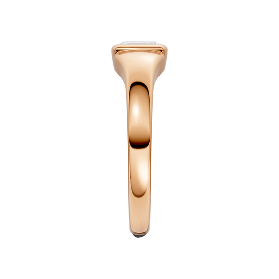 A side-profile view of Amorati Diamonds Horizon Diamond Ring, a 10K rose gold ring with a single, emerald lab-grown diamond in a sleek, curving band.