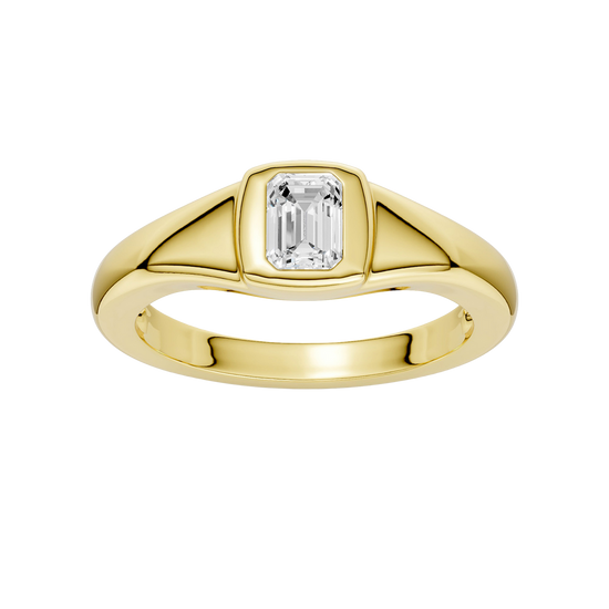 Amorati Diamonds Horizon Diamond Ring: A top-down view of a sleek, curving 10K yellow gold band with a lab-grown emerald solitaire.