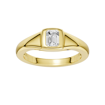 Amorati Diamonds Horizon Diamond Ring: A top-down view of a sleek, curving 10K yellow gold band with a lab-grown emerald solitaire.