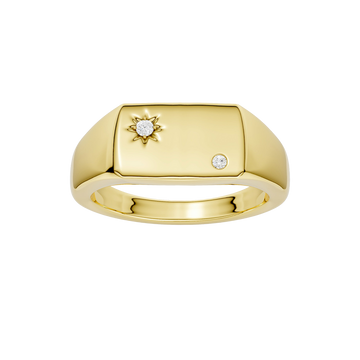 A top-down view of a 14K yellow gold signet ring with a sunburst motif and a brilliant round jewel.
