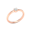 An angled view of a 14K rose gold ring, showcasing the brilliant center diamond and its pavé halo.