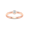 A top-down view of a 14K rose gold ring with a round diamond and a pavé halo.