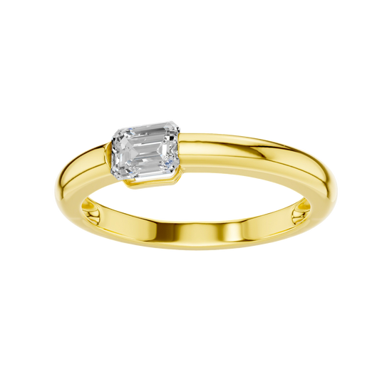 A top-down view of a 14K yellow gold ring with a series of horizontal, square-cut diamonds.