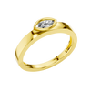 An angled view of a 14K yellow gold bypass ring, showcasing the bezel-set oval diamond and the overlapping band.