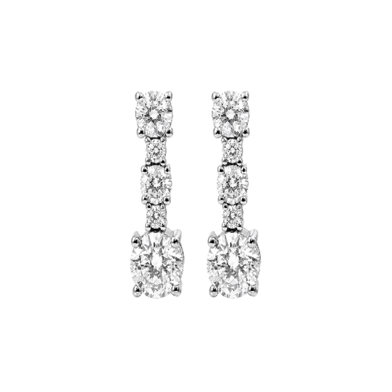A pair of silver-toned drop earrings featuring multiple round-cut clear gemstones arranged in a vertical baroque-style design, shown against a plain white background.
