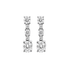 A pair of silver-toned drop earrings featuring multiple round-cut clear gemstones arranged in a vertical baroque-style design, shown against a plain white background.