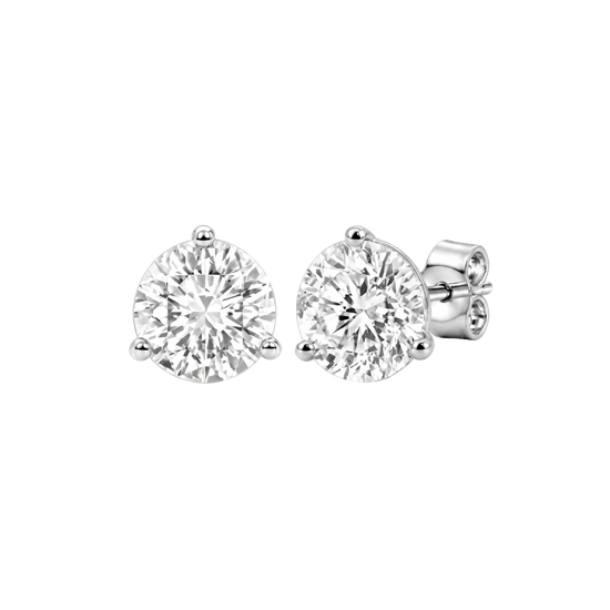 Angled front view of two round diamond stud earrings.
