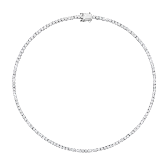 A silver tennis necklace with a row of small clear stones, featuring a rectangular clasp, shown on a plain white background.