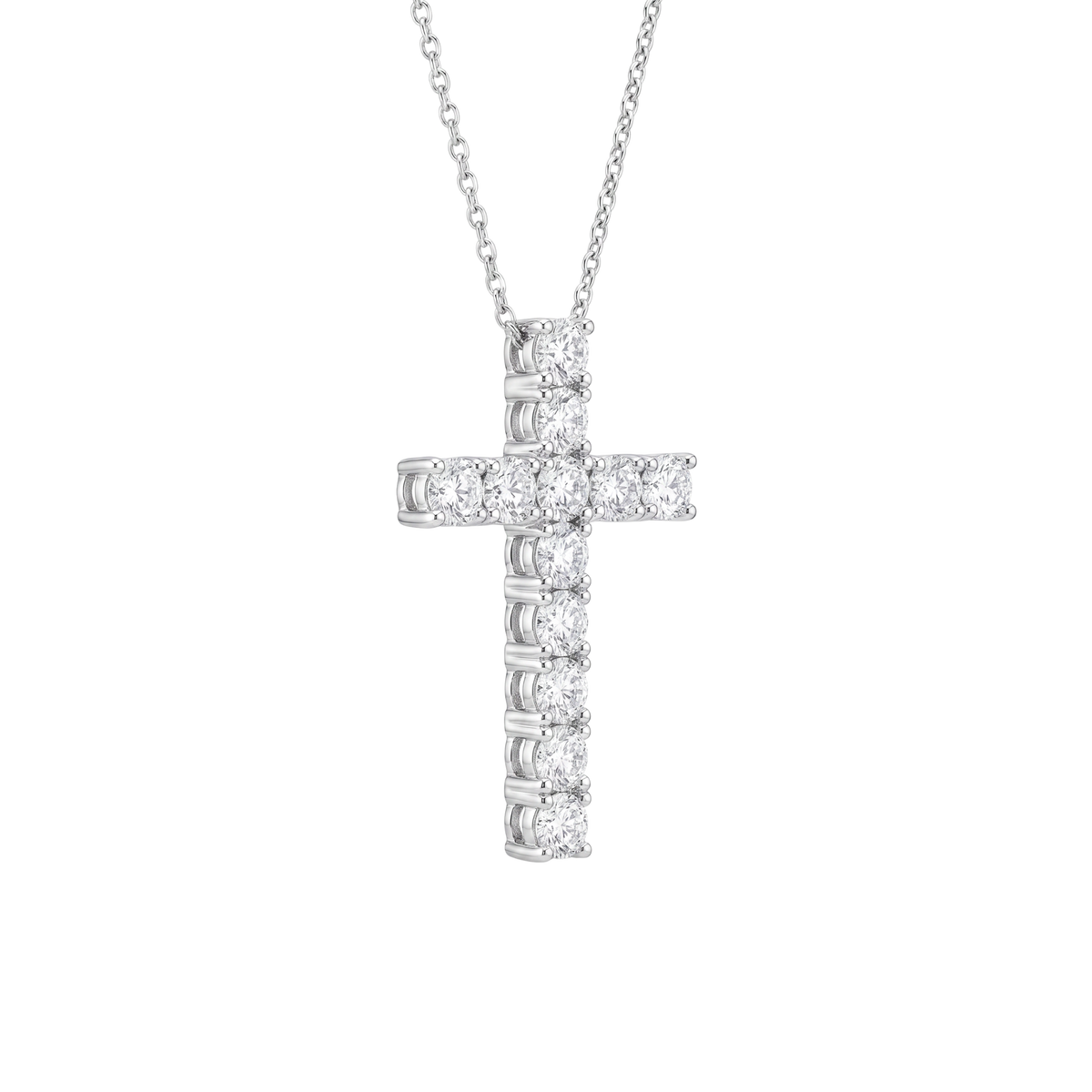 A silver cross pendant necklace adorned with clear round-cut gemstones, suspended from a delicate silver chain against a plain white background.