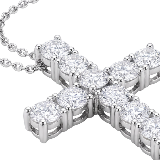 A close-up of a silver-toned cross pendant necklace set with round brilliant-cut clear gemstones on a white background.