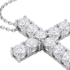 A close-up of a silver-toned cross pendant necklace set with round brilliant-cut clear gemstones on a white background.