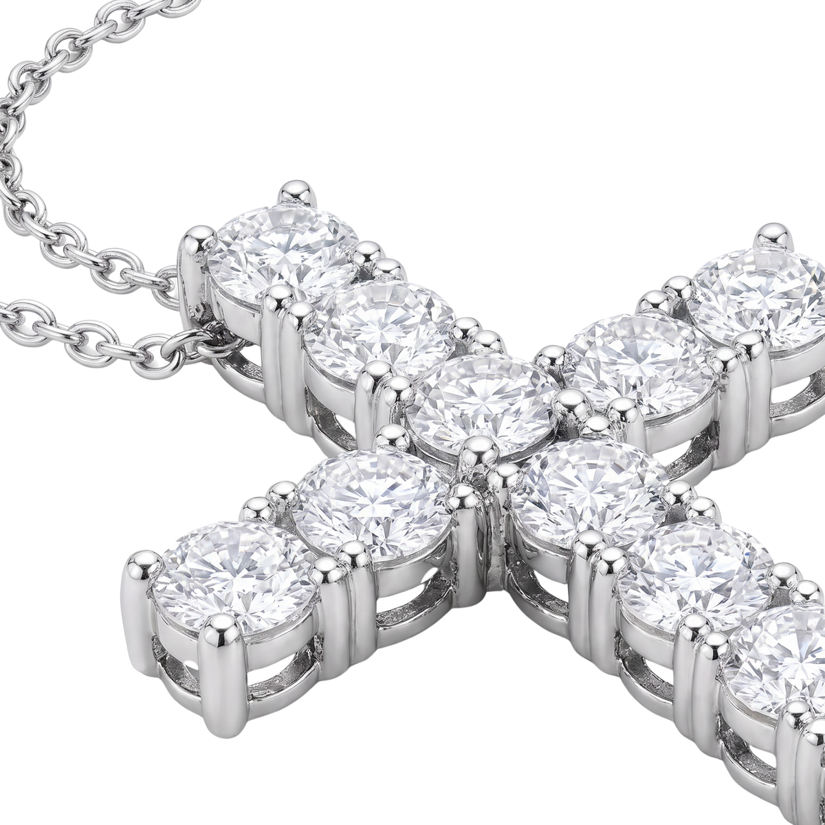 A close-up of a silver-toned cross pendant necklace set with round brilliant-cut clear gemstones on a white background.