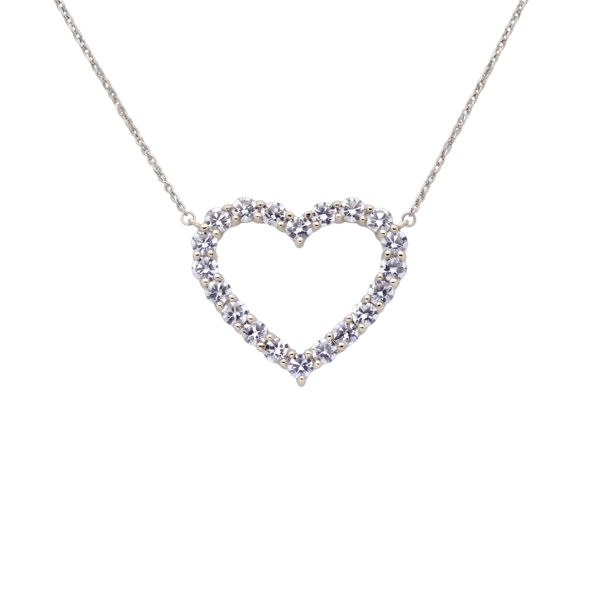 A silver heart-shaped pendant necklace adorned with small clear stones, suspended from a delicate silver chain against a plain white background.
