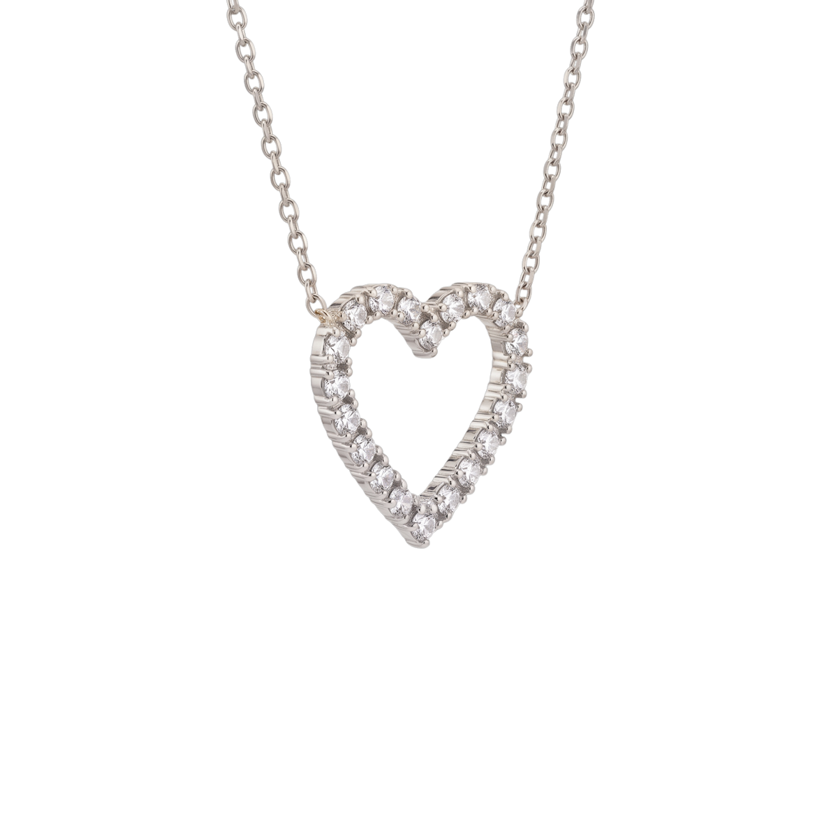 A silver heart-shaped pendant necklace adorned with small clear stones, suspended from a delicate silver chain against a plain white background.
