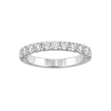 A silver diamond eternity ring with a row of round-cut diamonds set in a polished silver band, shown against a plain white background.