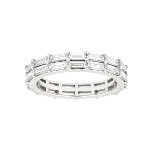 A silver eternity ring featuring baguette-cut clear gemstones set in a polished silver band, shown against a plain white background.