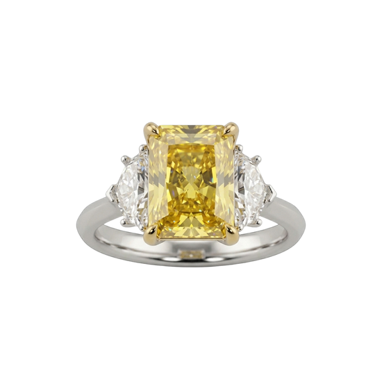 A top-down view of a three-stone engagement ring against a solid black background. The center features a large, pastel yellow emerald-cut diamond set in four yellow gold prongs. It is flanked by two smaller, clear white diamond side stones. The band of the ring is a smooth, polished white metal.