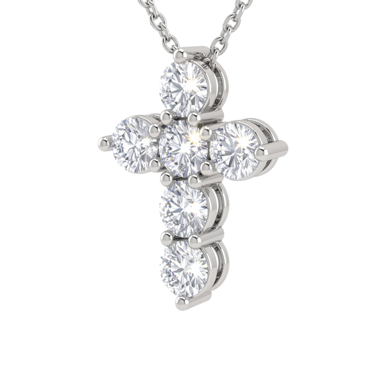 Angled view of a white gold diamond cross necklace pendant. The perspective highlights the depth of the sparkling round diamonds and the secure prong settings holding them.