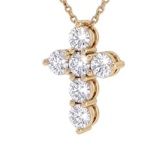 Angled view of a yellow gold diamond cross necklace pendant. The perspective highlights the depth of the sparkling round diamonds and the secure prong settings holding them.